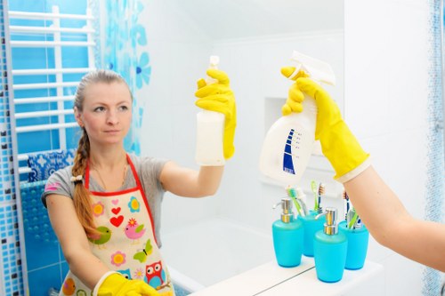 Professional carpets cleaner in Ealing cleaning a living room carpet