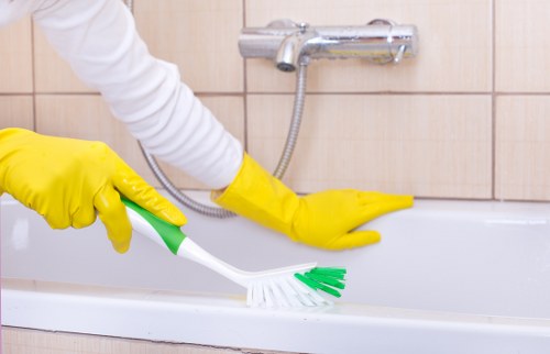 Cleaner in Ealing performing detailed kitchen cleaning